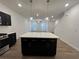 Open floor plan features a kitchen island, stainless appliances and plenty of living space at 2105 Stillhaven Pl, Douglasville, GA 30135