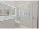 Modern bathroom featuring stylish vanity, updated toilet, and glass shower enclosure at 560 Dutch Valley Rd # 2313, Atlanta, GA 30324