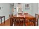 The dining room includes a wood table and a decorous floral vase at 756 Moreland Se Ave, Atlanta, GA 30316