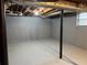 Unfinished basement showcasing concrete walls, exposed ceiling, and sturdy support beams at 184 Wana Se Cir, Mableton, GA 30126