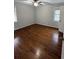 Bright bedroom with hardwood floors and two windows offering natural light at 184 Wana Se Cir, Mableton, GA 30126