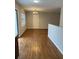Cozy dining area with hardwood floors and a sliding glass door to a deck at 184 Wana Se Cir, Mableton, GA 30126