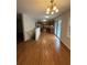 Spacious kitchen with stainless steel appliances, wood cabinets and hardwood floors at 184 Wana Se Cir, Mableton, GA 30126