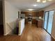 Open kitchen with stainless steel appliances, wood cabinets and hardwood floors at 184 Wana Se Cir, Mableton, GA 30126