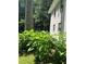 Vibrant flowers and lush greenery adorn the side of this well-maintained home at 184 Wana Se Cir, Mableton, GA 30126