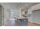 Modern kitchen featuring a large island, pendant lighting, stainless steel appliances, and ample space at 3316 Cranston Ln, Kennesaw, GA 30144