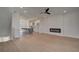 Open-concept living space boasts wood floors, a sleek fireplace, and modern decor accents at 3316 Cranston Ln, Kennesaw, GA 30144