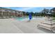 Community pool with lounge chairs and umbrellas for residents to enjoy on a sunny day at 3316 Cranston Ln, Kennesaw, GA 30144