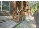 Rear exterior with multi-level deck, wood stairs, and gravel area at 482 Pearl Cove Ct, Atlanta, GA 30350