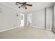 A bright room featuring neutral paint and easy access to the ensuite bath at 5065 Avalon Dr, Alpharetta, GA 30005