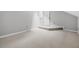 A carpeted bonus room with stair access at 5065 Avalon Dr, Alpharetta, GA 30005