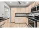 Well-equipped kitchen featuring stainless steel appliances, ample cabinet space, and a functional design at 5065 Avalon Dr, Alpharetta, GA 30005