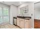 Charming kitchen featuring light-colored cabinets, modern appliances, and a convenient layout at 5065 Avalon Dr, Alpharetta, GA 30005