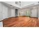 Inviting living room featuring hardwood floors, natural light, and an open layout perfect for modern living at 5065 Avalon Dr, Alpharetta, GA 30005