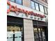 A view of the Orangetheory Fitness storefront, featuring its logo and entrance at 5065 Avalon Dr, Alpharetta, GA 30005