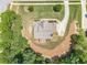 Lush property with an estate home, trees, and a winding driveway at 135 Waterlace Way, Fayetteville, GA 30215