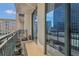 Private balcony boasting city views, perfect for outdoor relaxation and entertainment with room for a grill at 3040 Peachtree Nw Rd # 613, Atlanta, GA 30305