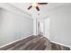 Empty bedroom with wood-look flooring and modern ceiling fan at 3040 Peachtree Nw Rd # 613, Atlanta, GA 30305