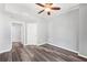 Bright bedroom features wood-look flooring and walk-in closet at 3040 Peachtree Nw Rd # 613, Atlanta, GA 30305