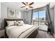 Charming bedroom with balcony access and hardwood floors at 3040 Peachtree Nw Rd # 613, Atlanta, GA 30305