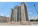 Upscale high-rise building featuring balconies and impressive architectural design at 3040 Peachtree Nw Rd # 613, Atlanta, GA 30305