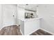A kitchen with an island, stainless steel appliances, white cabinets, and modern fixtures at 3040 Peachtree Nw Rd # 613, Atlanta, GA 30305