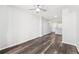 Bright living room features wood-look flooring and ceiling fan at 3040 Peachtree Nw Rd # 613, Atlanta, GA 30305