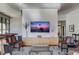 Community lounge area with comfortable seating, a large screen TV, and a nearby billiards table at 3040 Peachtree Nw Rd # 613, Atlanta, GA 30305