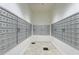 View of tenant mailboxes within the building with marble flooring and painted white walls at 3040 Peachtree Nw Rd # 613, Atlanta, GA 30305