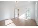 Spacious bedroom with hardwood floors and access to a modern bathroom at 4332 Kay Morgan Rd, Buford, GA 30519