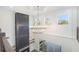 Grand foyer with a modern chandelier and views of the upstairs loft and outdoor patio at 4332 Kay Morgan Rd, Buford, GA 30519