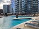 Stunning rooftop pool with seating and city views at 1080 Peachtree Ne St # 2915, Atlanta, GA 30309