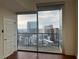Condo bedroom balcony showcasing city views at 1080 Peachtree Ne St # 2915, Atlanta, GA 30309