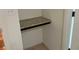 Closet showing shelf with granite counter and neutral walls and floor at 1080 Peachtree Ne St # 2915, Atlanta, GA 30309