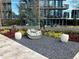 Chic outdoor seating area with comfortable chairs and elegant landscaping features at 1080 Peachtree Ne St # 2915, Atlanta, GA 30309