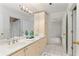 Spacious bathroom with double vanity, mirrors and an open doorway at 211 Colonial Homes Nw Dr # 1303, Atlanta, GA 30309