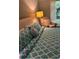 Comfortable bedroom featuring a plush bed with decorative pillows and a chair near the window at 3251 Abbeywood Dr, Decatur, GA 30034