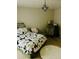 Bright bedroom with modern decor featuring a comfortable bed, stylish chair, and decorative light fixture at 3251 Abbeywood Dr, Decatur, GA 30034