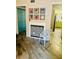 Elegant fireplace featuring black and white tile and a cozy chair at 3251 Abbeywood Dr, Decatur, GA 30034