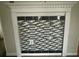 Close up on the black and white tiled fireplace at 3251 Abbeywood Dr, Decatur, GA 30034
