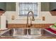 Stainless dual basin sink with high arc faucet set beneath a window, offering a functional space at 3251 Abbeywood Dr, Decatur, GA 30034