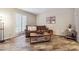 Inviting living room with wood floors, comfy sofa, and bright natural light at 3251 Abbeywood Dr, Decatur, GA 30034