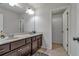 Bathroom featuring double sink vanity and shower at 3890 Pleasant Woods Dr, Cumming, GA 30028