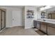 Bathroom featuring double sink vanity, and shower with glass door at 3890 Pleasant Woods Dr, Cumming, GA 30028