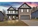 Beautiful two story home with a brick front, a covered porch, a well-maintained yard, and an attached garage at 3890 Pleasant Woods Dr, Cumming, GA 30028
