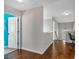 Hallway with hardwood floors and access to the second floor at 3890 Pleasant Woods Dr, Cumming, GA 30028