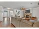 Spacious living room featuring an open layout, fireplace, and hardwood floors at 3890 Pleasant Woods Dr, Cumming, GA 30028