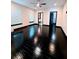 Modern bedroom with dark hardwood floors and modern lighting at 657 S Grand Nw Ave, Atlanta, GA 30318