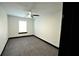 Cozy bedroom with a ceiling fan and natural light, perfect for relaxation at 657 S Grand Nw Ave, Atlanta, GA 30318