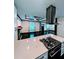 Modern kitchen with quartz countertops and stainless steel appliances at 657 S Grand Nw Ave, Atlanta, GA 30318